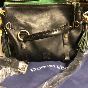 D& B Black purse with green interior.